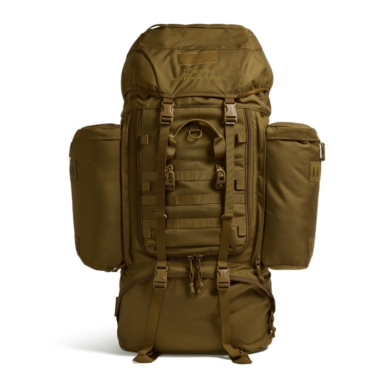 Front view of the Crusader 90 + 20 FA rucksack in earth brown showing MMPS design, front access compartment, and side pouches.