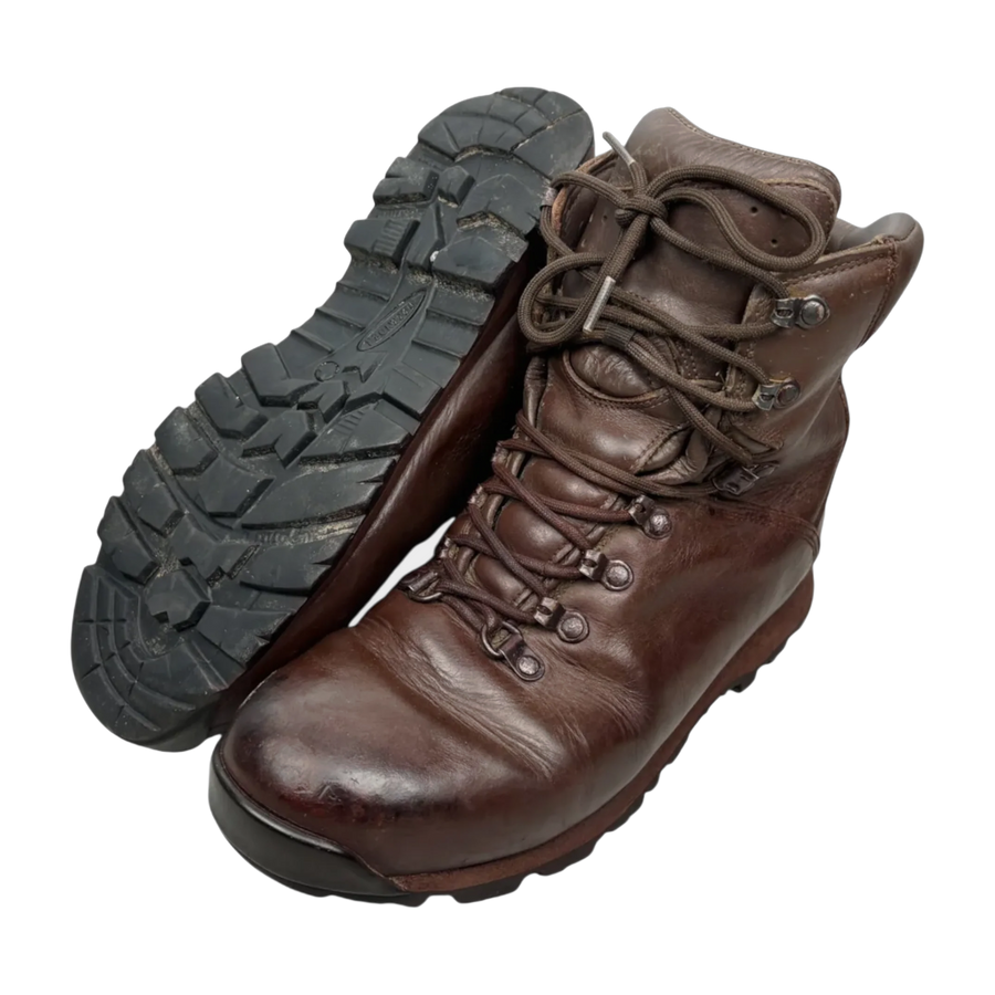 Brown leather Iturri patrol combat boots, pair shown with one boot upright and one tilted to display the black lug sole, British military surplus, transparent cutout
