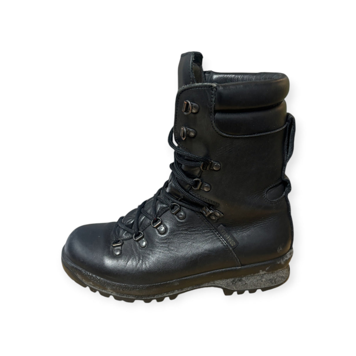 Side View of ECW Pro Boots: A side profile of the black leather ECW boots, highlighting the padded collar and sleek military design.