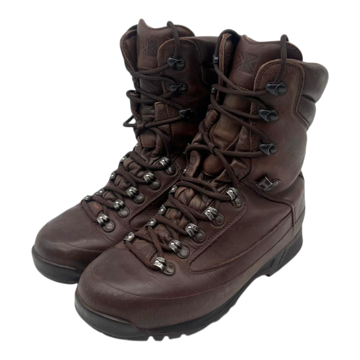 Pair of brown leather Karrimor SF British Army combat boots, front three-quarter view, laced, on white background.