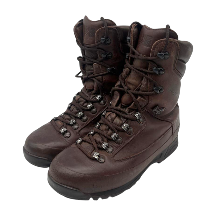 Pair of brown leather Karrimor SF British Army combat boots, front three-quarter view, laced, on white background.