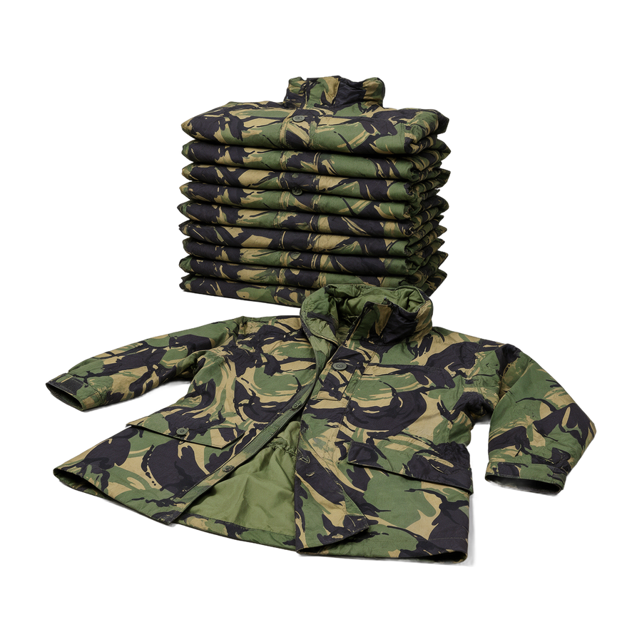 Stack of ten genuine British Army DPM waterproof smocks with one laid out in front - bulk pack of 10
