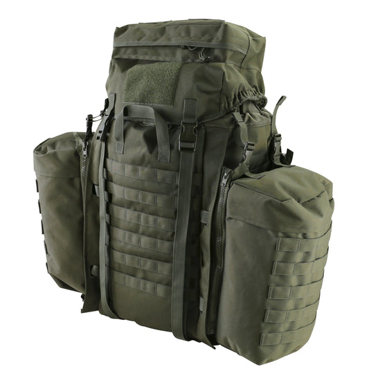 Green 90-litre Tactical Assault Pack with padded contoured shoulder harness and vented back system. Features large main compartment, zipped lid pocket, Velcro ID panel, and Molle platform area. Includes compression straps, carry handle, sternum strap, padded Molle waist belt, and attached side pouches.