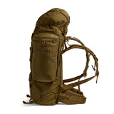 Side profile of the Crusader 90 + 20 FA military backpack in earth brown showing compression straps and padded harness system.