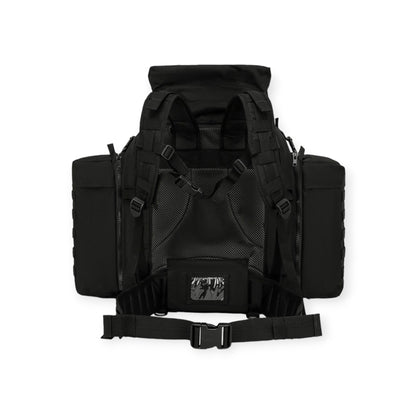 Kombat UK Black 90 litre Tactical Assault Rucksack with padded shoulder harness  Features large main compartment, zipped lid pocket, Velcro ID panel, and Molle platform area. Includes compression straps, carry handle, sternum strap, padded Molle waist belt, and attached side pouches.