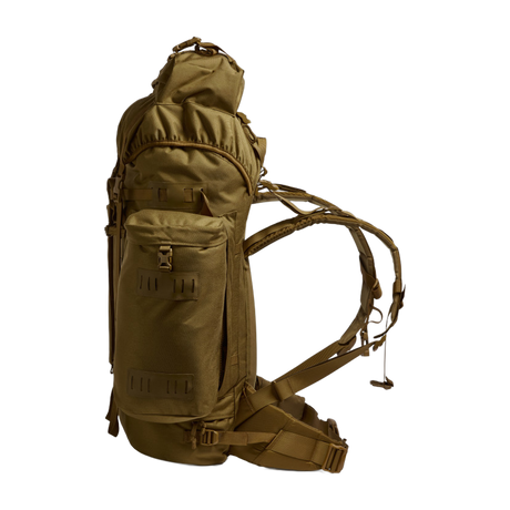 Side profile of the Berghaus Vulcan V MMPS rucksack in earth brown showing side pocket, compression straps, and adjustable harness.