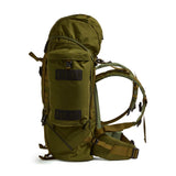 Side profile of the Crusader 90 + 20 FA military rucksack showing front access pocket, compression straps, and padded hip belt in olive green.