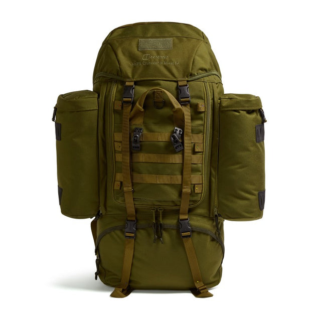Front view of the Crusader 90 + 20 FA MMPS rucksack with twin side pouches, MOLLE webbing, and front access panel in olive green.