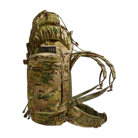 Side profile of the Berghaus Vulcan V MMPS rucksack in MTP multicam camouflage showing side pocket, compression straps, and padded hip belt.