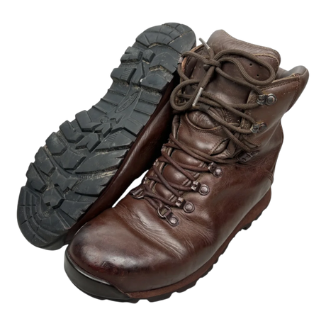 Brown leather Iturri patrol combat boots, pair shown with one boot upright and one tilted to display the black lug sole, British military surplus, transparent cutout