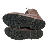 Sole view of brown leather Iturri patrol combat boots, two boots stacked showing black lug tread pattern, military surplus, transparent cutout