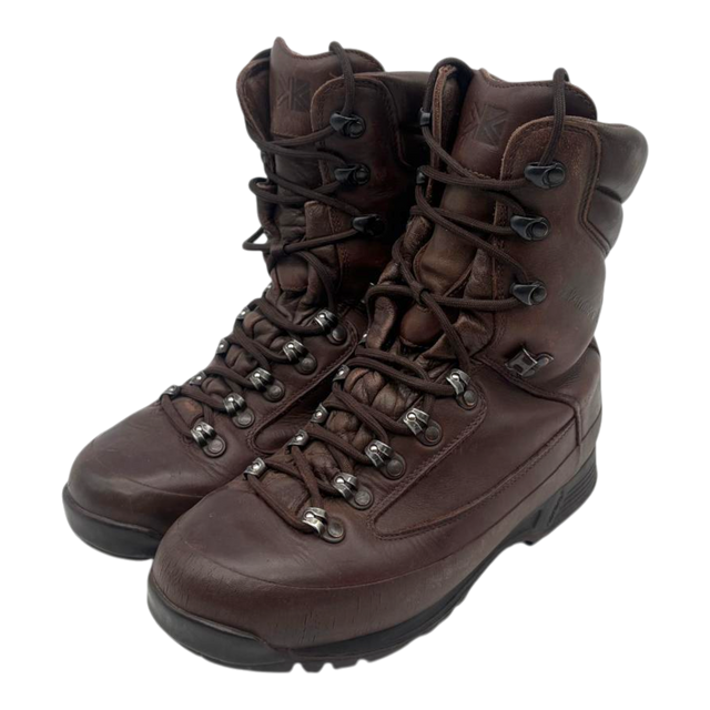 Pair of brown leather Karrimor SF British Army combat boots, front three-quarter view, laced, on white background.