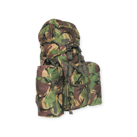 Discover the reliability and ruggedness of the Kombat UK Woodland DPM Bergen Rucksack. With a 120L capacity and 78x60x30cm dimensions, it features a versatile day sack system, multiple pockets, side compression straps, padded shoulder straps, and a waist belt. Made from 600D Tac-Poly with a removable internal aluminium frame.