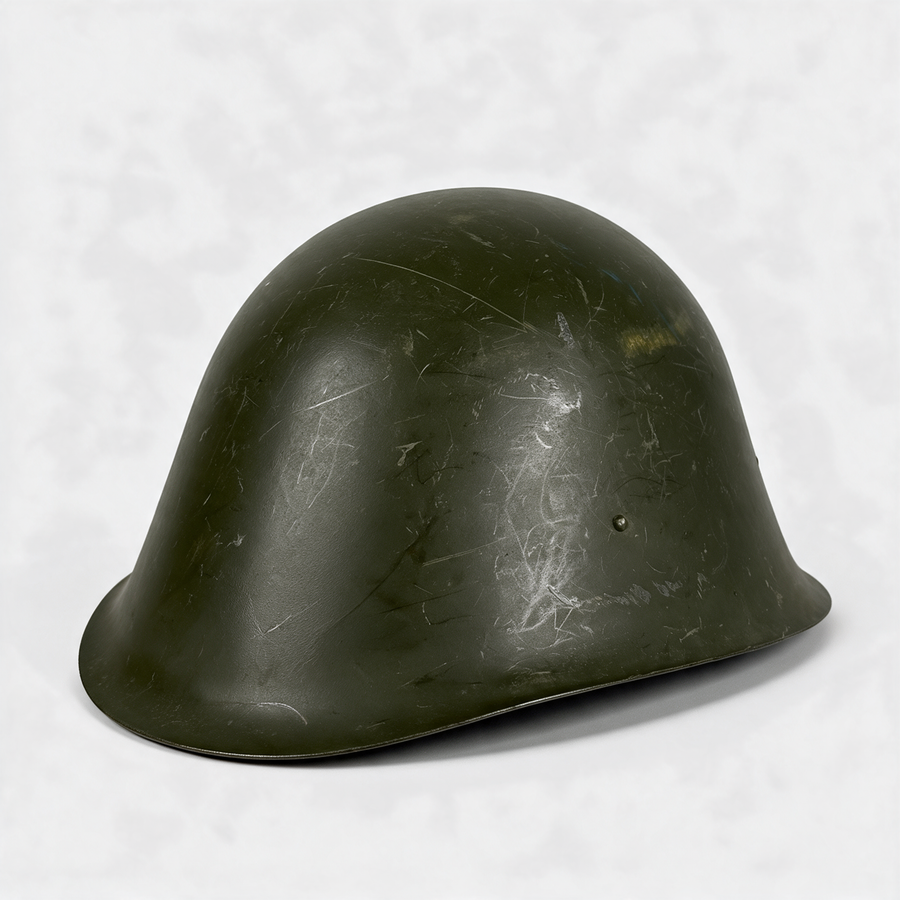 Romanian Army M73 steel combat helmet in olive green, three-quarter view
