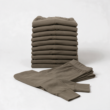 Stack of ten pairs of brown British Army thermal bottoms - bulk pack of 10 pairs