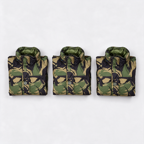 Three genuine British Army DPM waterproof smocks laid out in a row - pack of 3