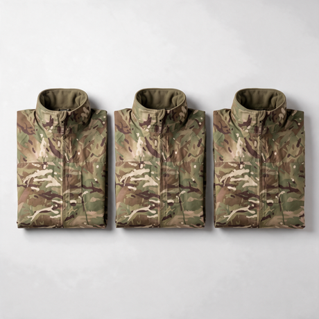 Three genuine British Army MTP lightweight waterproof Gore-Tex jackets laid out in a row - pack of 3