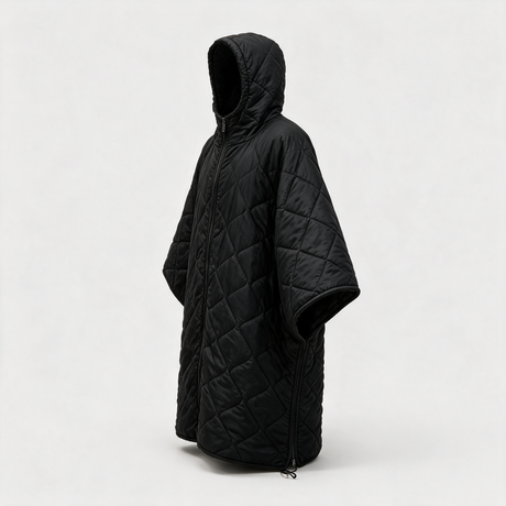 Black poncho liner zipped closed into a hooded sleeping cape, side view
