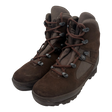 Pair of brown Haix Desert suede combat high liability boots, front three-quarter view, showing suede toe, fabric panels, lace hooks, and rugged sole on white background.