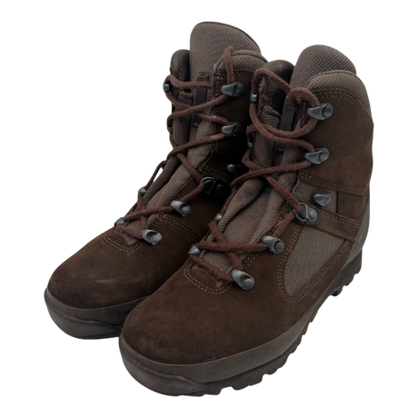 Pair of brown Haix Desert suede combat high liability boots, front three-quarter view, showing suede toe, fabric panels, lace hooks, and rugged sole on white background.